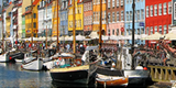 Colourful facade and old ships along the Nyhavn Canal in Denmark